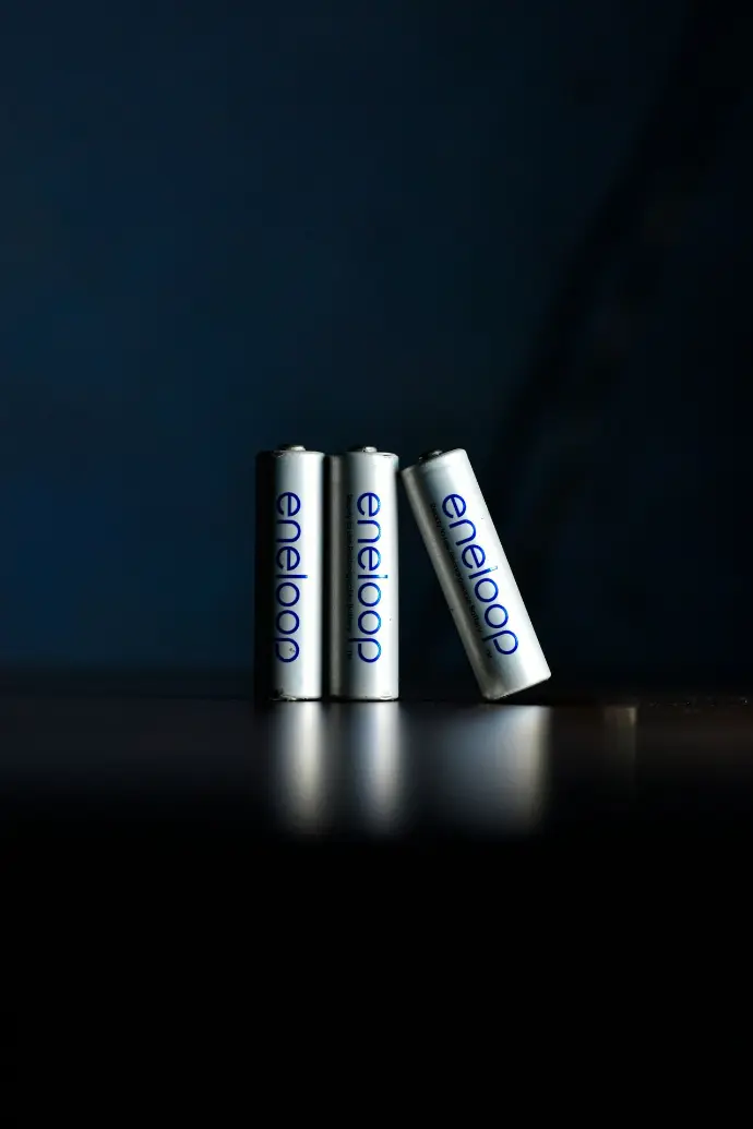 a couple of batteries sitting on top of a table